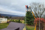 November 21, 2024

EMA Member Ed Ferguson installs a new windsock atop the tower. The windsock view can be seen on our website